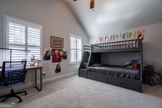 bedroom with lofted ceiling, carpet floors, ceiling fan, and baseboards