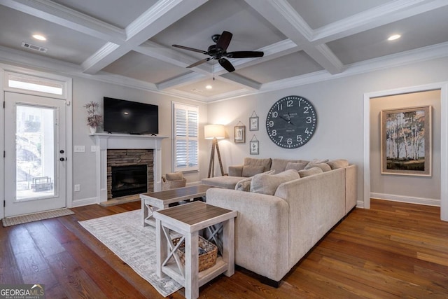 living area with dark wood-style floors, coffered ceiling, and beam ceiling