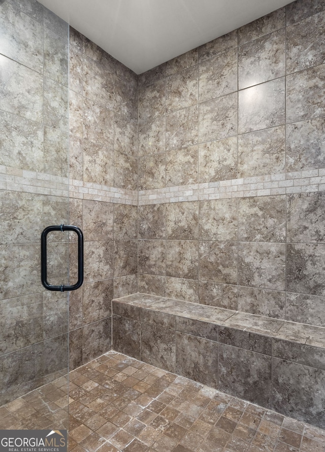 interior space featuring a shower stall