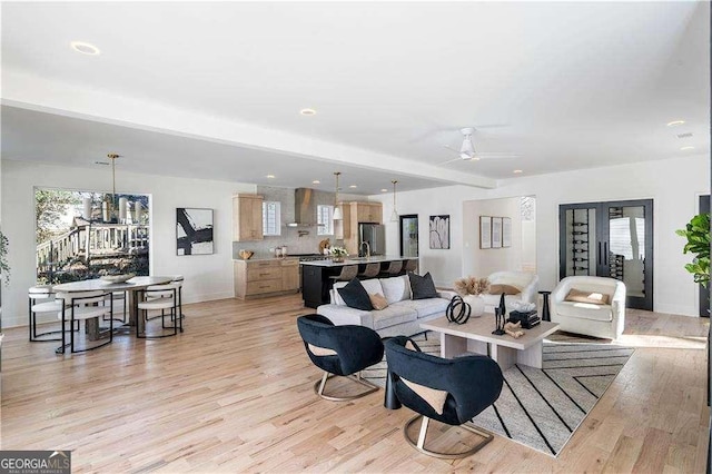 1273 Danner St SE, Atlanta, GA 30316 - living room with light wood-style flooring, plenty of natural light, baseboards, and recessed lighting