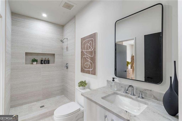 1273 Danner St SE, Atlanta, GA 30316 - full bath with a tile shower, vanity, and toilet
