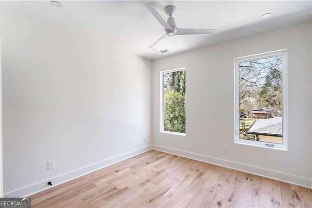 1273 Danner St SE, Atlanta, GA 30316 - spare room with ceiling fan, plenty of natural light, light wood-style flooring, and baseboards