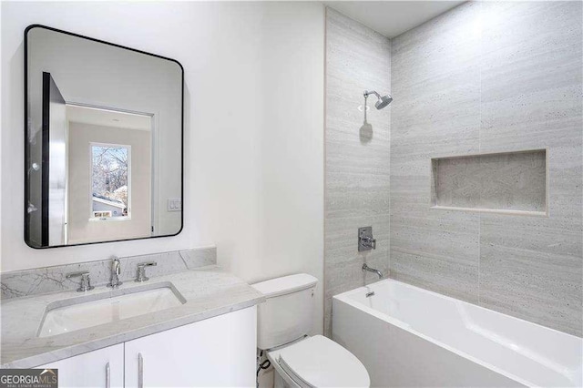 1273 Danner St SE, Atlanta, GA 30316 - full bath featuring toilet, vanity, and washtub / shower combination