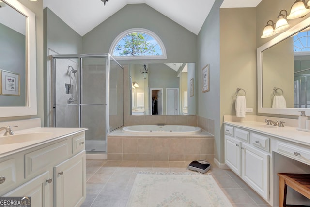 bathroom with a sink and a shower stall