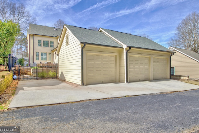 detached garage with fence