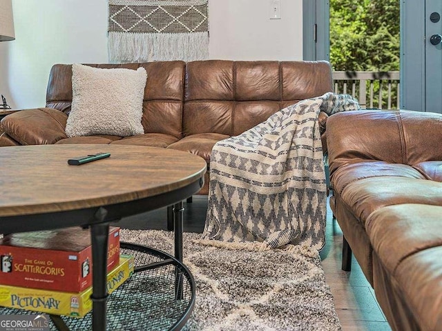 living room with wood finished floors