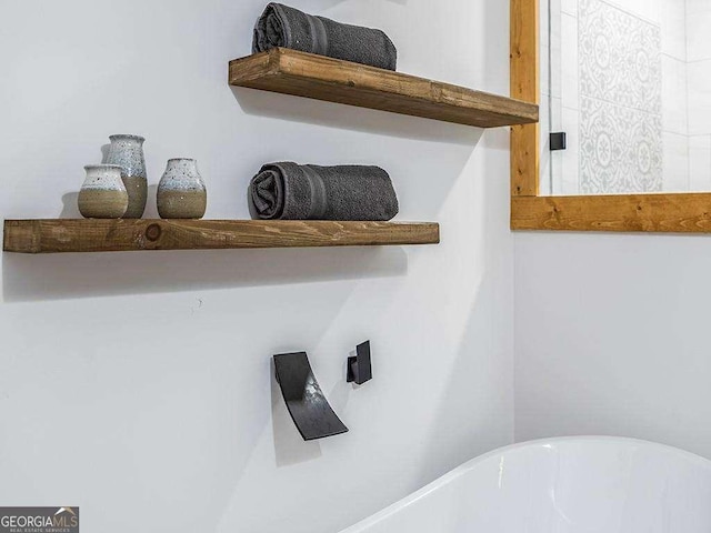 interior details featuring a soaking tub