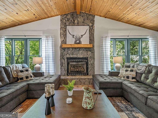 living room with vaulted ceiling with beams, a fireplace, wooden ceiling, and dark wood-style floors