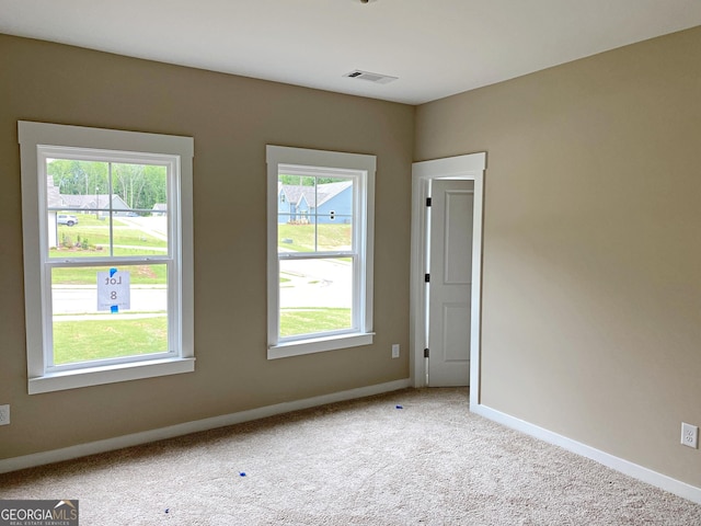101 Westminster Ct, Winder, GA 30680 - spare room with plenty of natural light and carpet floors