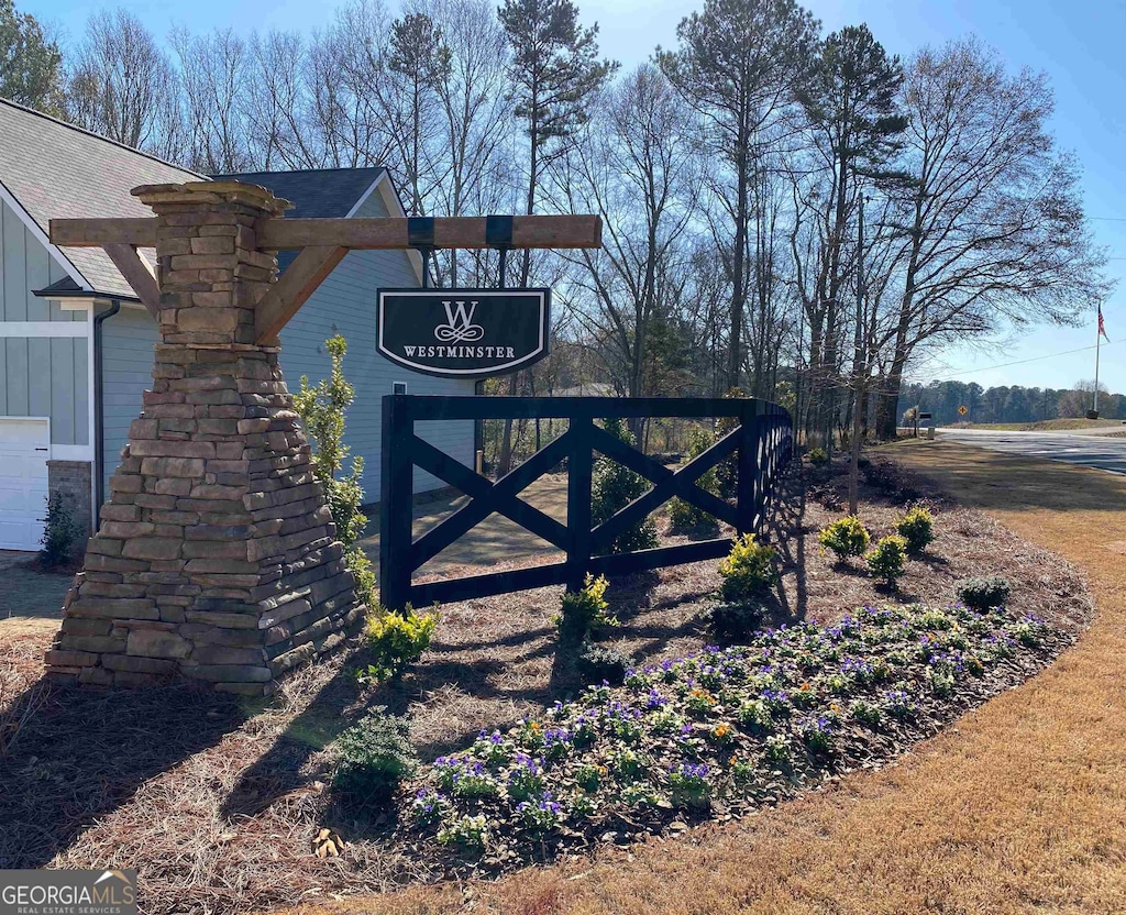 exterior space featuring a gate