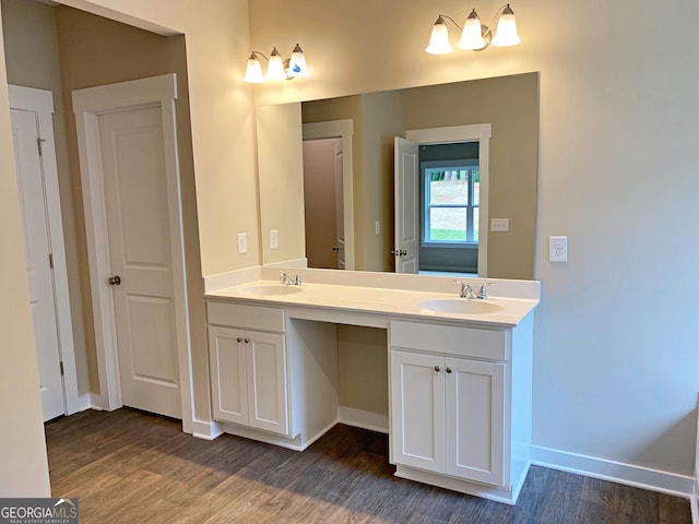 101 Westminster Ct, Winder, GA 30680 - full bath featuring wood finished floors and double vanity