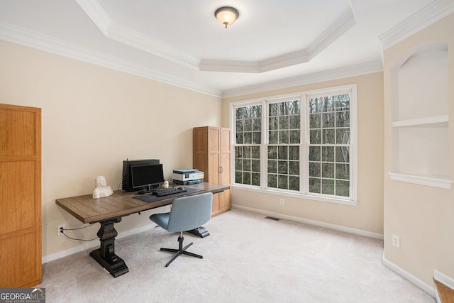 carpeted home office featuring a raised ceiling, visible vents, crown molding, and baseboards