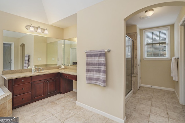 bathroom with a shower stall, visible vents, and tile patterned floors