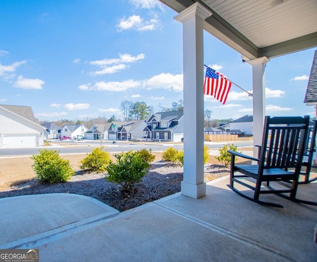 view of patio featuring a residential view and covered porch