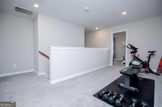 workout area featuring carpet floors, recessed lighting, and baseboards