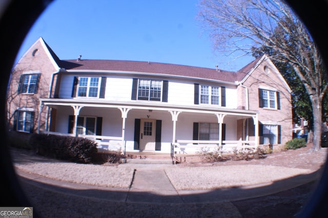 view of front of home featuring covered porch