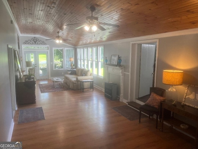 interior space with wood finished floors, wood ceiling, and crown molding