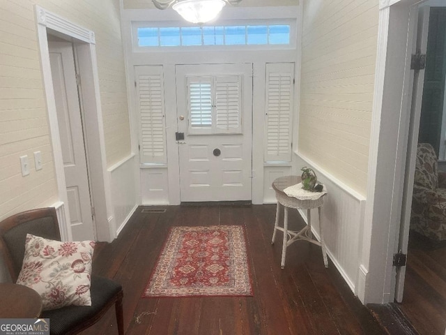 entrance foyer featuring dark wood-style flooring