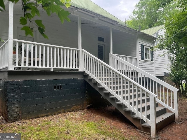 exterior space with metal roof