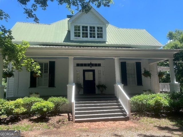 view of front of house with metal roof