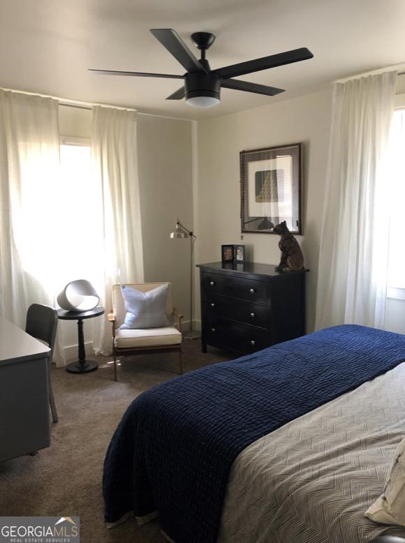 345 Loomis Ave, Atlanta, GA 30312 - bedroom with a ceiling fan and dark colored carpet