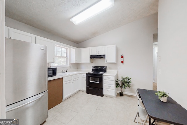 kitchen with under cabinet range hood, a sink, white cabinetry, light countertops, and black appliances