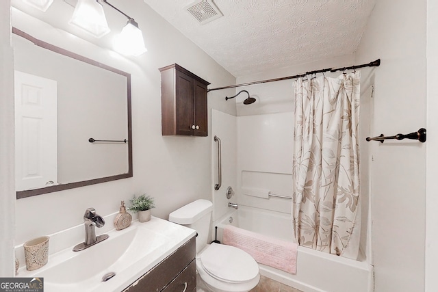 full bath with a textured ceiling, toilet, vanity, visible vents, and shower / tub combo with curtain