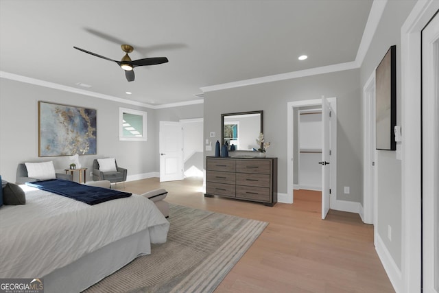 bedroom featuring recessed lighting, a ceiling fan, baseboards, light wood-style floors, and ornamental molding