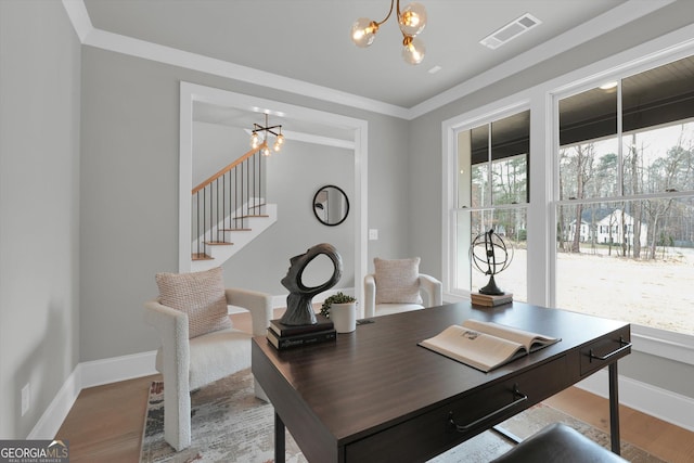 office with a chandelier, visible vents, baseboards, and wood finished floors