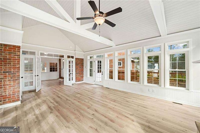 unfurnished sunroom with french doors, visible vents, ceiling fan, and lofted ceiling with beams