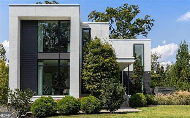 exterior space featuring stucco siding