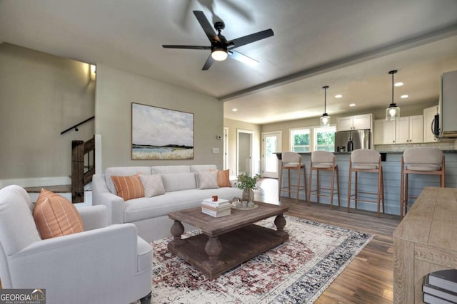 living area featuring dark wood-type flooring, recessed lighting, and a ceiling fan