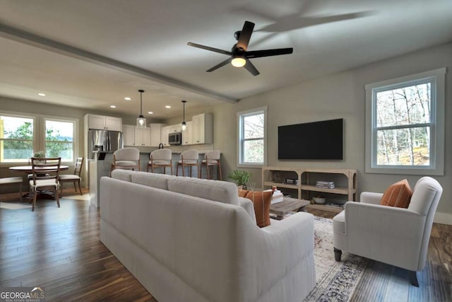 living room with recessed lighting, dark wood-style flooring, a healthy amount of sunlight, and ceiling fan