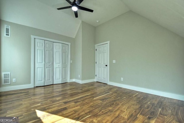 unfurnished bedroom featuring dark wood-type flooring, visible vents, and baseboards