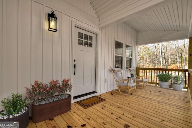 doorway to property with a porch