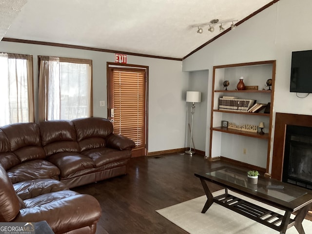 3630 High Point Ln SW, Atlanta, GA 30331 - living room featuring lofted ceiling, a fireplace, crown molding, wood finished floors, and baseboards