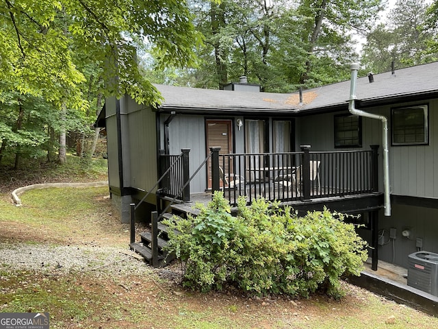 3630 High Point Ln SW, Atlanta, GA 30331 - rear view of property featuring cooling unit and a chimney