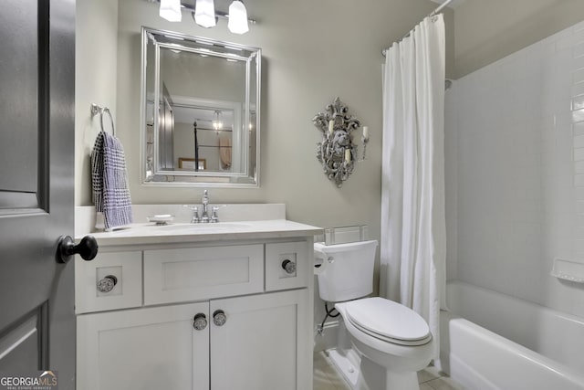 full bath featuring vanity, toilet, and shower / bath combo with shower curtain