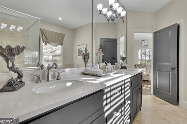 bathroom featuring double vanity, tile patterned flooring, a sink, and recessed lighting