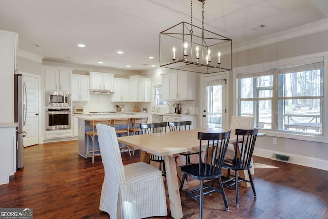 dining area featuring recessed lighting, dark wood-style flooring, visible vents, baseboards, and ornamental molding