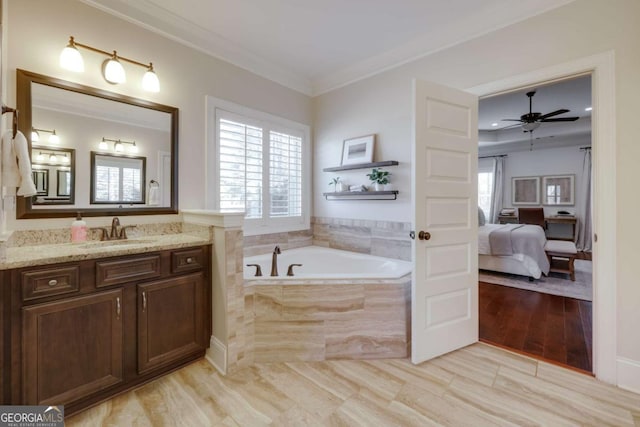 bathroom featuring ensuite bathroom, ornamental molding, plenty of natural light, and a garden tub