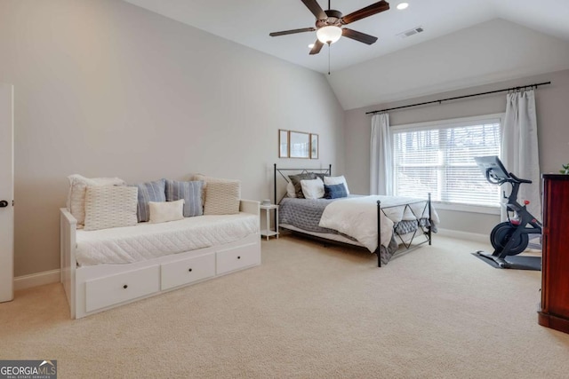 bedroom with light colored carpet, lofted ceiling, visible vents, and baseboards