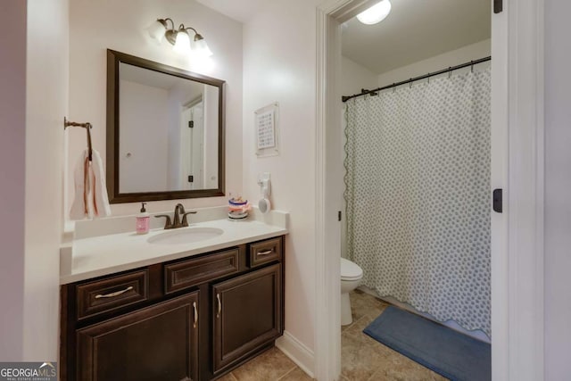 bathroom featuring toilet, tile patterned floors, curtained shower, and vanity