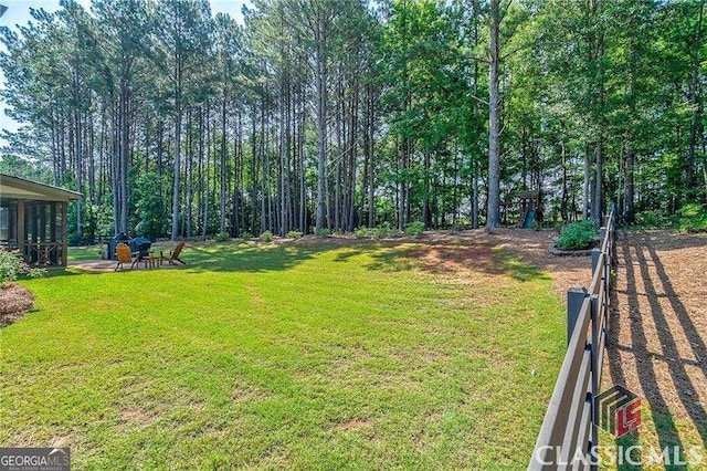 view of yard featuring fence