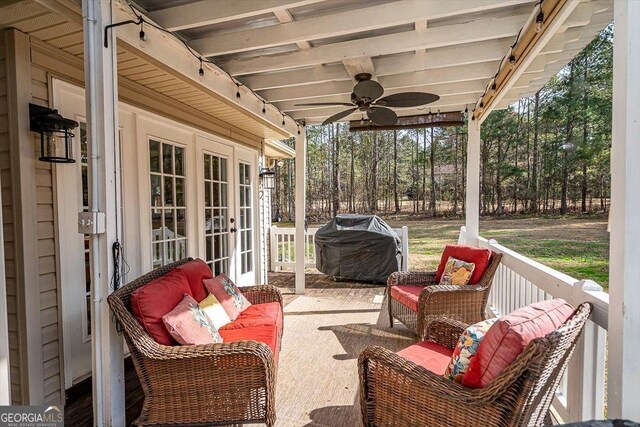 view of patio / terrace with french doors, a ceiling fan, an outdoor hangout area, and grilling area