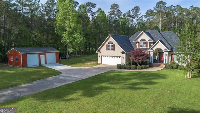 view of front of house with an outbuilding, a front lawn, and a garage