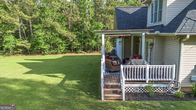 view of yard featuring a deck