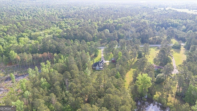 aerial view featuring a forest view