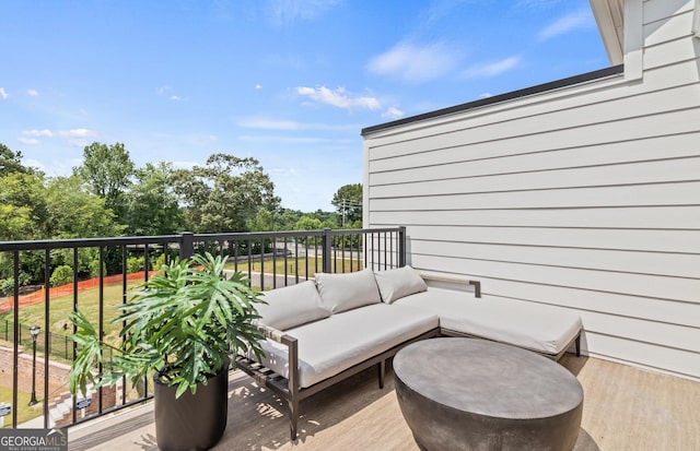 balcony with an outdoor hangout area