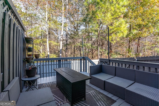 deck featuring outdoor lounge area